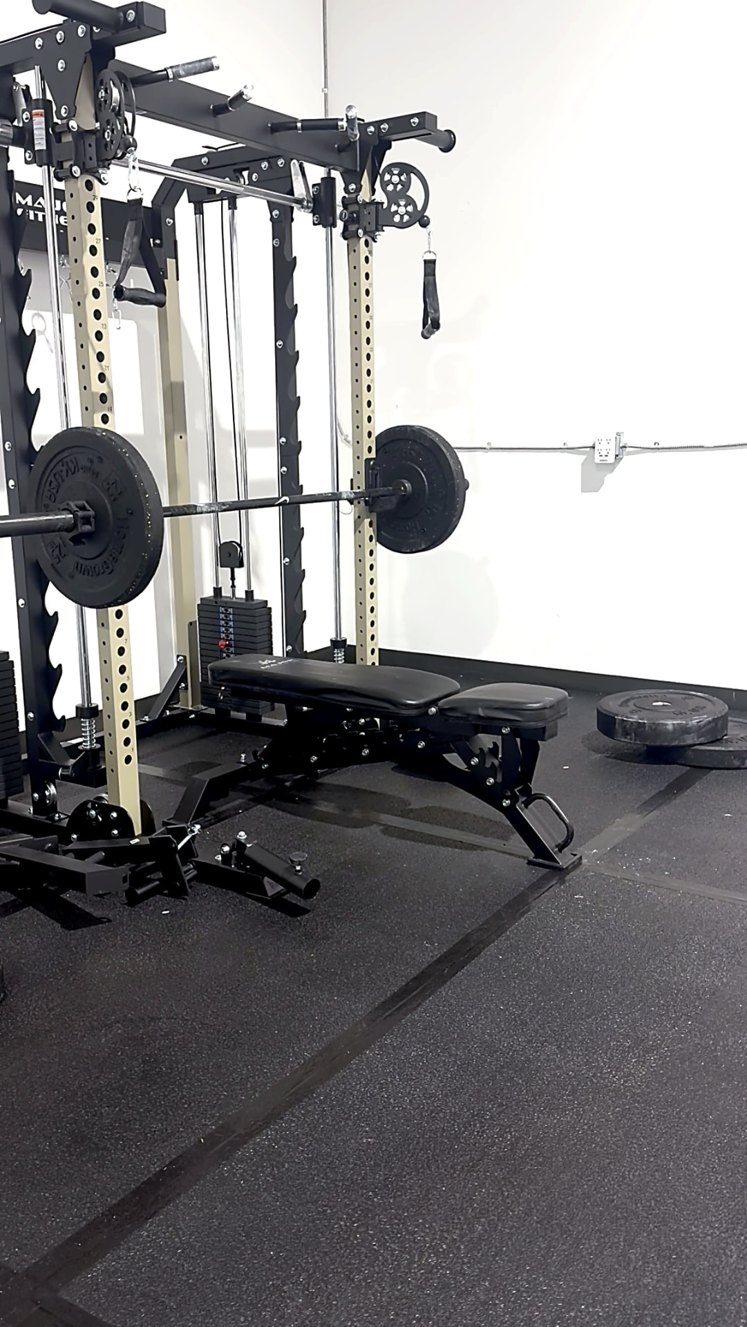 Functional trainer and cardio area at Apex Performance